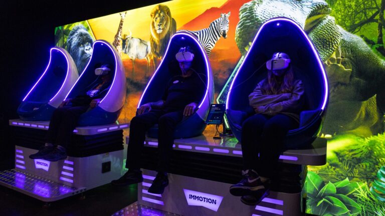 Guests in VR headsets on Immotion motion seats at Wild Explorer, the Buffalo Zoo's seated VR attraction in M&T Bank Rainforest Falls. Photo: Buffalo Zoo